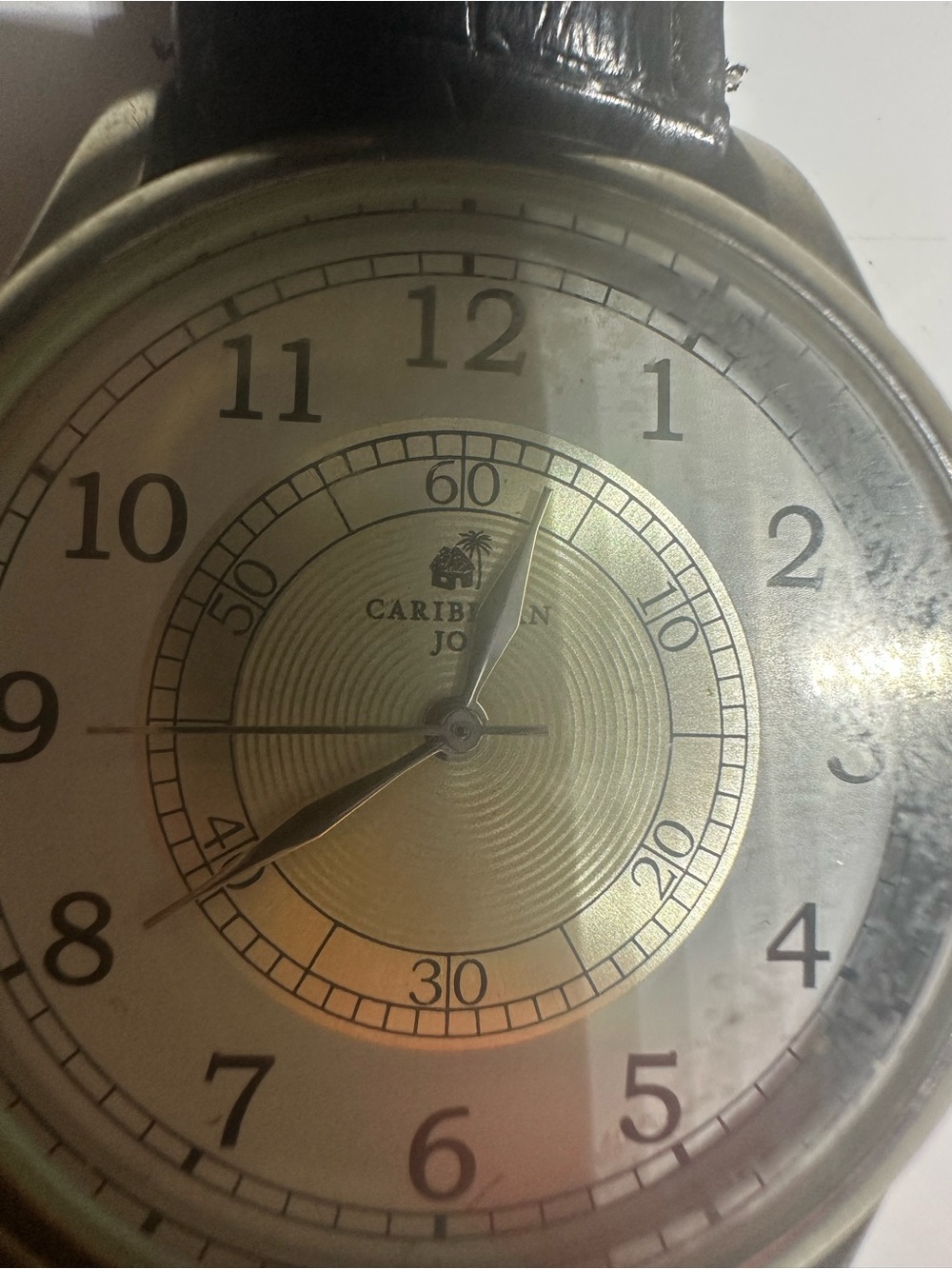 Caribbean Joe Gold and Black Wall Clock